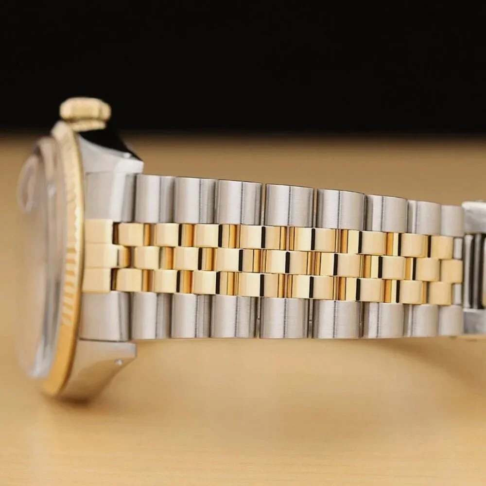 ROLEX MENS DATEJUST BLACK TAPESTRY DIAL 18K YELLOW GOLD STEEL WATCH